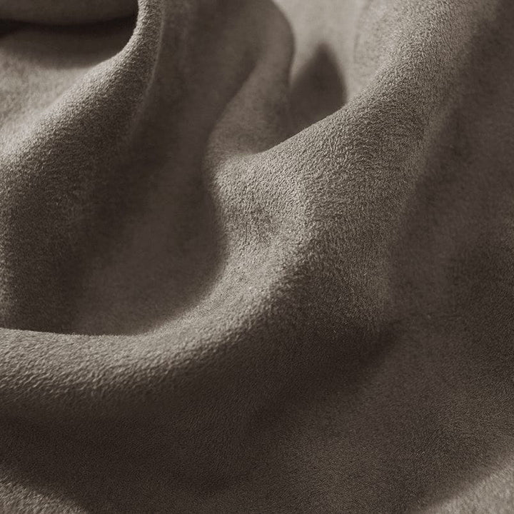 Close-up of textured brown fabric