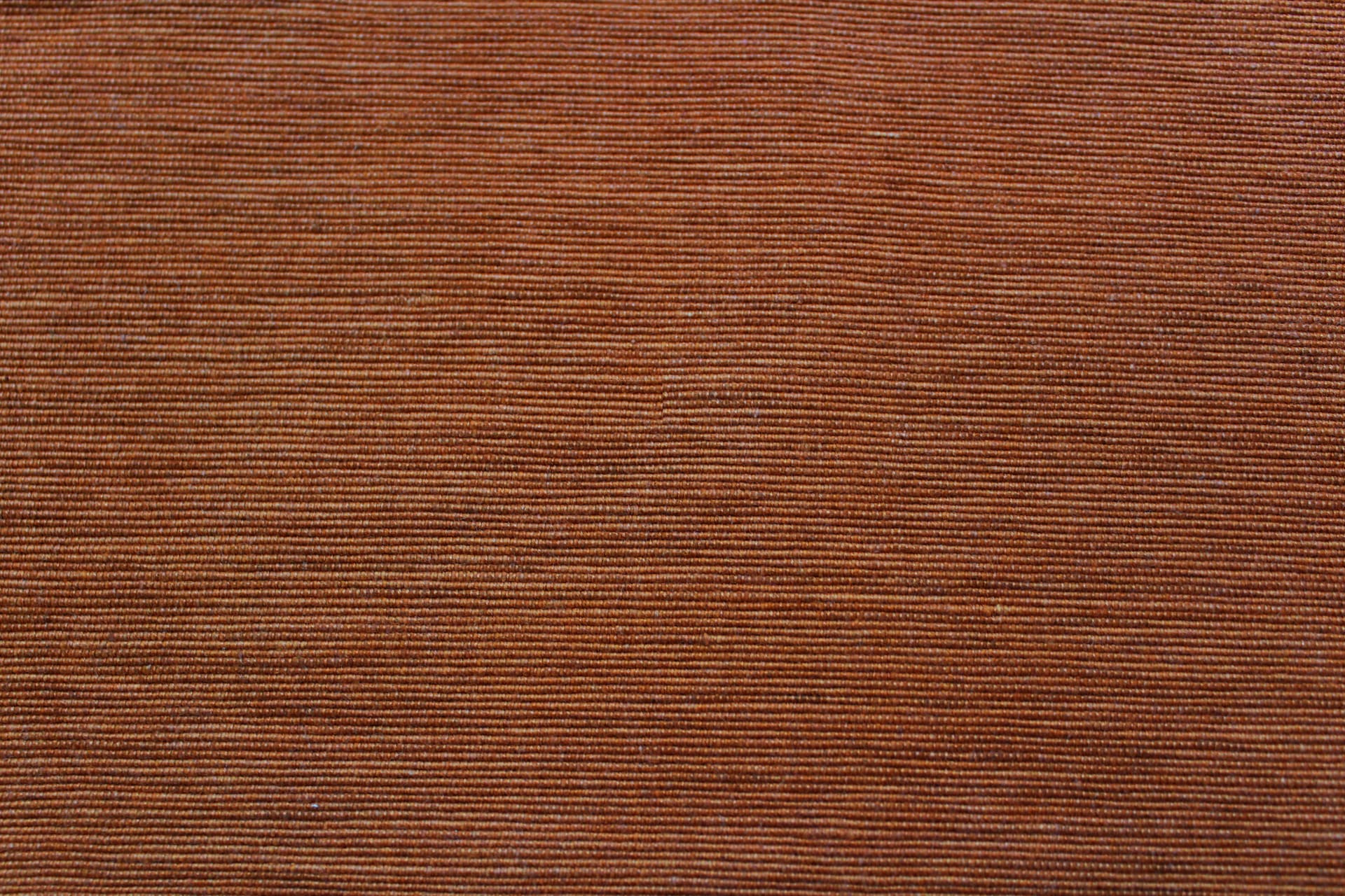 Rust Handloom Corded Weave 330 GSM Plain Cotton Fabric (122 cms) online in India